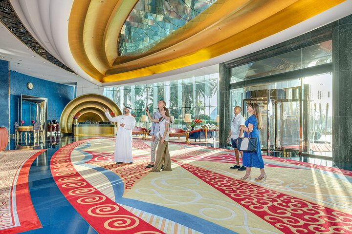 Step into the luxurious Burj Al Arab where exquisite design meets historic charm. Discover hidden gems of this iconic hotel before indulging in a feast of over 60 Arabic dishes.